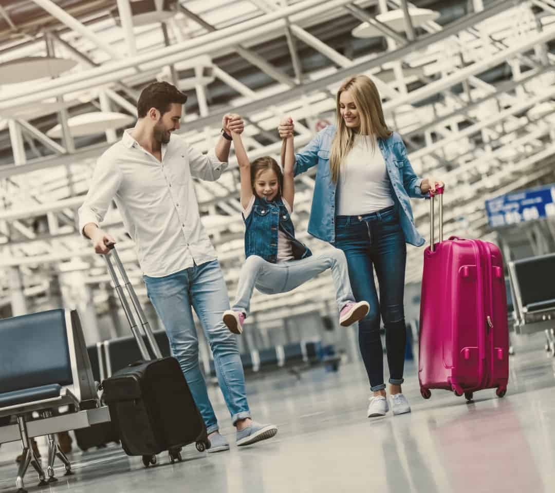 Family in airport having visa free travel with a passport by investment